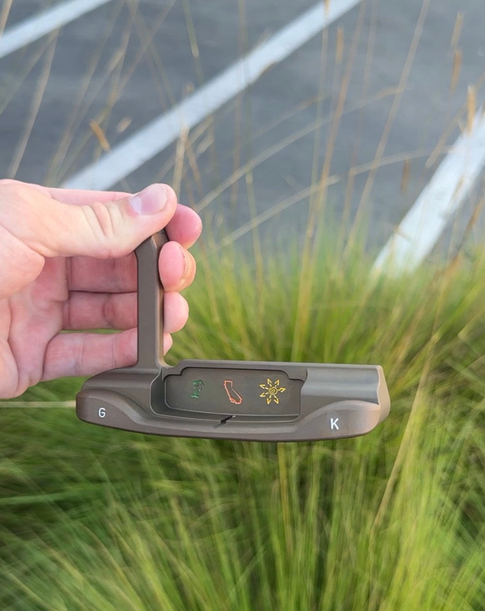 Custom Shop Putter golf club, side angle